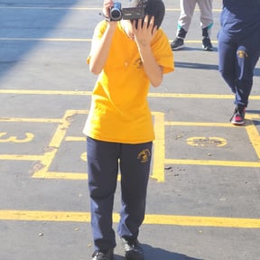 Kid with camera 2.JPG