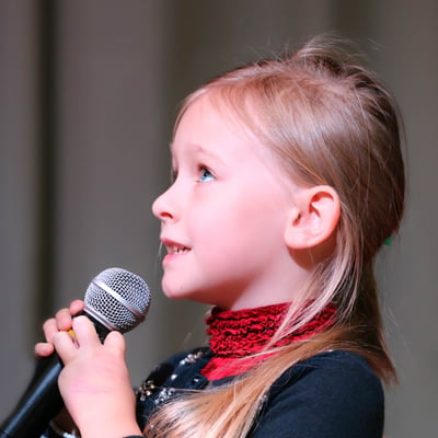 Performing Arts - Girl singing mic.jpg