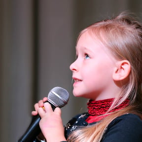 Performing Arts - Girl singing mic.jpg
