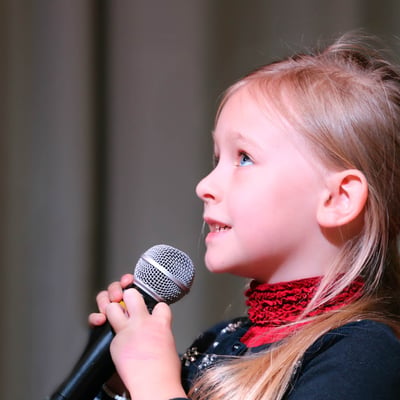 Performing Arts - Girl singing mic.jpg