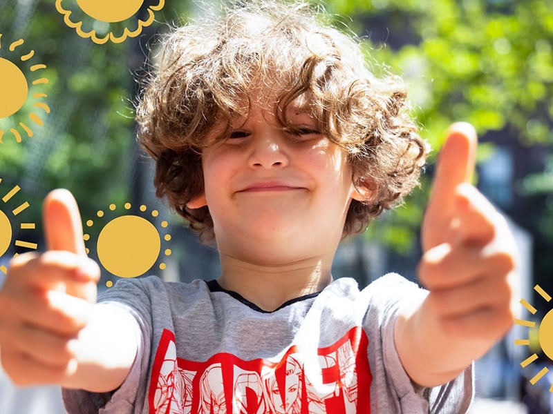 Boy giving thumbs up