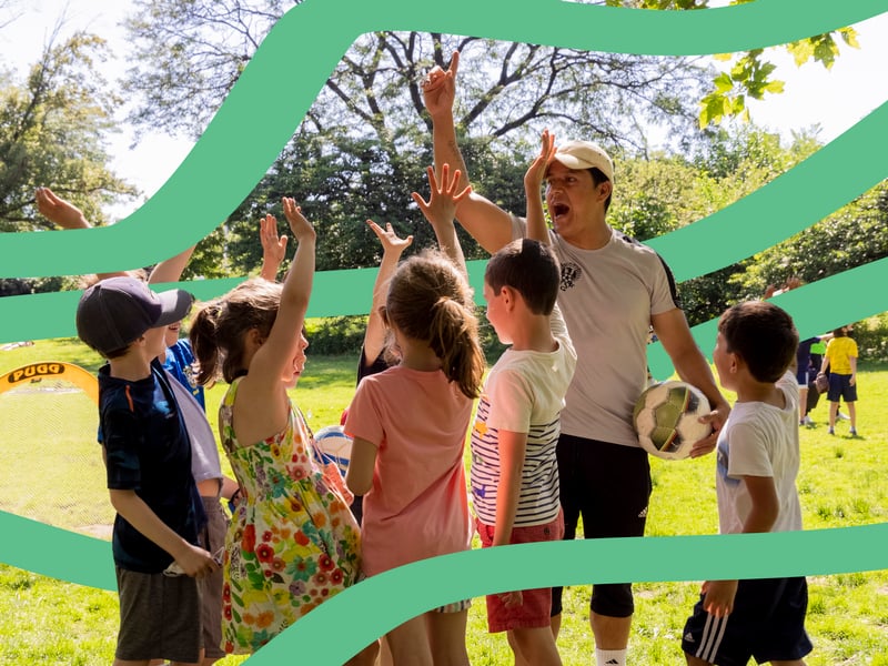 Kids and instructor playing outdoors